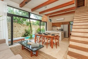 Ancient Mayan architecture & nature's elements collide organically