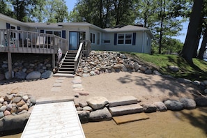 Sandy beach area, and minimal steps required to access water or house.