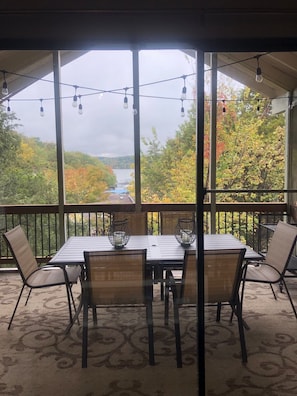 View from the screened in porch of the lake and fall foliage!