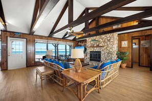 Living Room with a Fireplace + Ocean Views