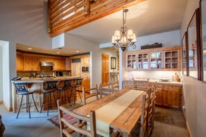 Large dining room table with seating for 8.