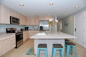 Kitchen with island seating for 6. 