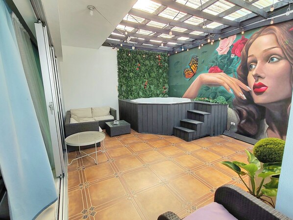 Private terrace with exciting Jacuzzi.