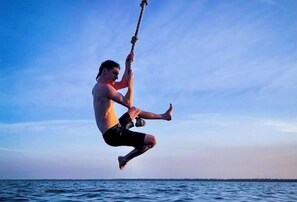 Rope swing fun on the lake!