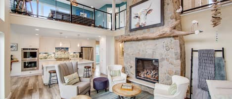 Floor to ceiling rock gas-fireplace