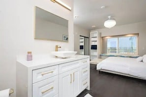 Master bath and bedroom with a view to the estuary