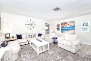 The house is bright, cheerful and furnished in an easy going, laid back style - like a beach vacation should be!