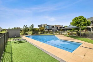 poolside position and lawn for the kids to play.