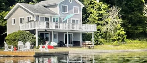 View of house, dock and beach from the water