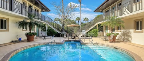 Pool in the cener courtyard, exterior remodel completed 10/2023