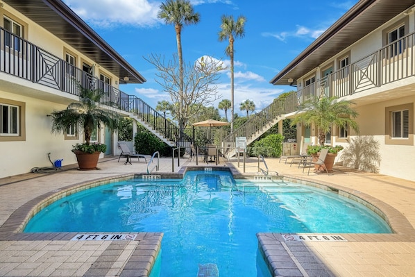 Pool in the cener courtyard, exterior remodel completed 10/2023