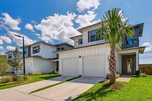 Two car garage with EV charger available.  Driveway parking as well.