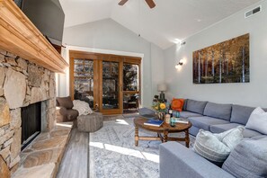 Living Room with a private hot tub deck access