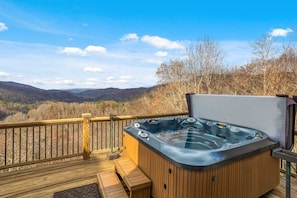 Hot Tub on Open Deck with Layered Mountain Views