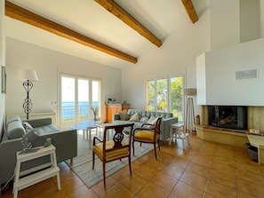 sea view living room with television