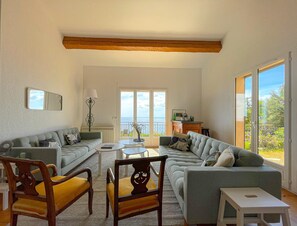 sea view living room with television