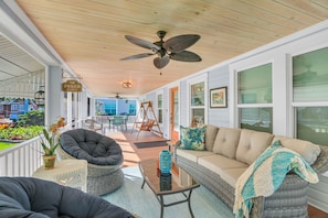 Front screen porch, comfortable seating, dining//game table, swing & ceiling fan