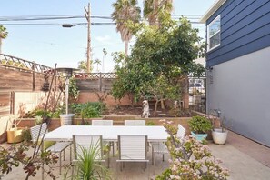 Enjoy alfresco dining out in the beautiful big backyard
