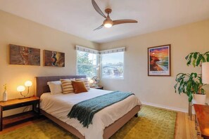 The elegant Master bedroom with a comfortable queen bed
