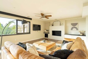 Relax on the inviting leather chaise lounge after a day’s adventure in the city