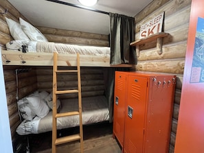 Bunks, each with 32” smart TV. 