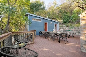 Spacious patio with outdoor dining and ping pong table!