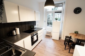 Fully Equipped Kitchenette with Dining Table