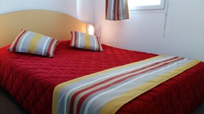 The master bedroom features a Double bed.