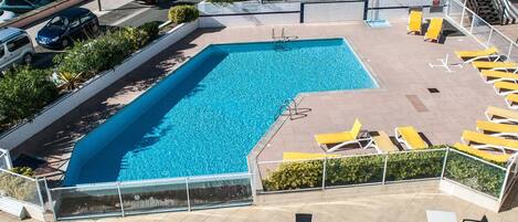 The outdoor pool is the perfect place to share some laughs with friends and family