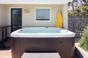 New five-person jacuzzi installed in the private back yard.