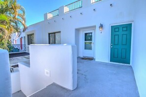 The Second Floor Landing and Front Door of the Condo And the Large Front Balcony!