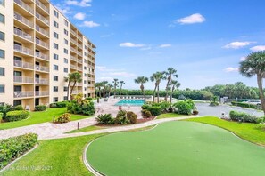 Putting green, pool and oceanfront