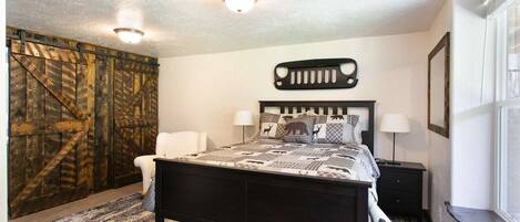 Bedroom with queen bed.  An extra twin bed can be pulled out if needed.