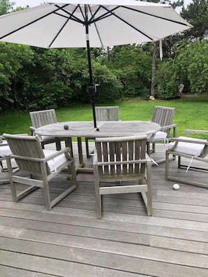 Dining table with umbrella
