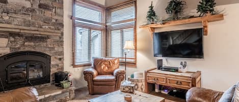 Living Room / Flat Screen TV / Wood Burning Fireplace