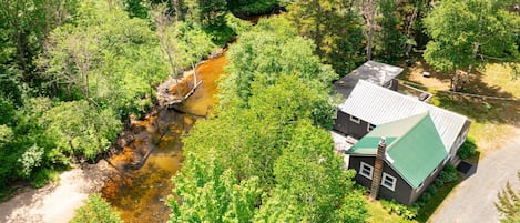 Cabin sits on the river