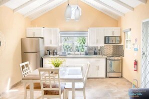 A fully-equipped kitchen to prepare meals at home.