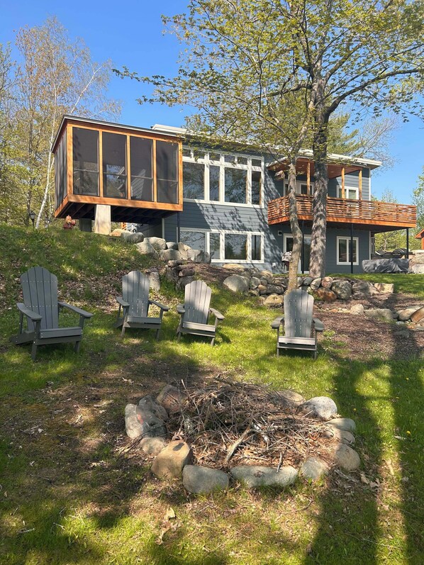 Lakeside view of cabin during spring