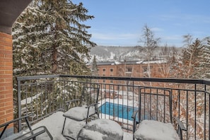 Step out to the private outdoor balcony and enjoy the views over the surrounding area.