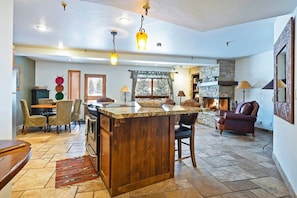 Fully-equipped kitchen with breakfast bar seating