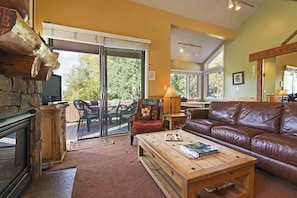 View of the family room and access to the private outdoor patio