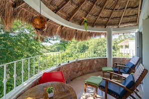 Private terrace overlooking the pool and golf course