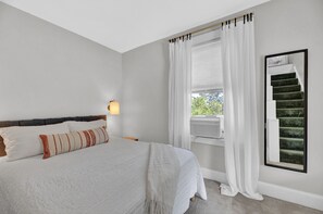 Master bedroom offers a warm, inviting slumber