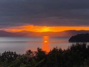 Breathtaking, unobstructed, panoramic sunsets across the widest section of Lake Champlain, taken from the backyard.