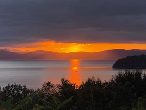 Breathtaking, unobstructed, panoramic sunsets across the widest section of Lake Champlain, taken from the backyard.