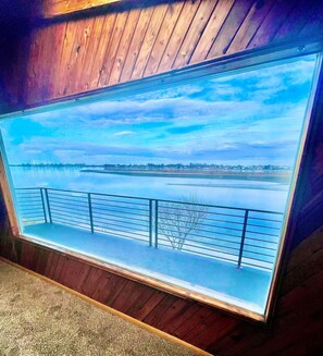 Wood room/sunroom view from couch - The perfect morning coffee spot!