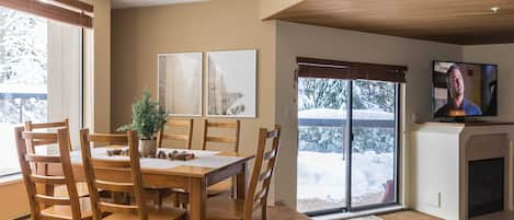 Bright dining room with picture window