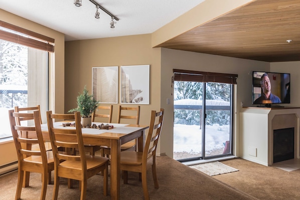 Bright dining room with picture window