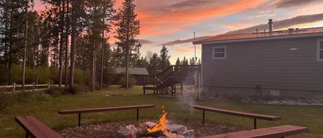 Backyard firepit. Lots of grass for the kids to play and a horseshoes!