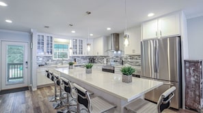 Beautiful modern kitchen with stainless steal appliances. 
